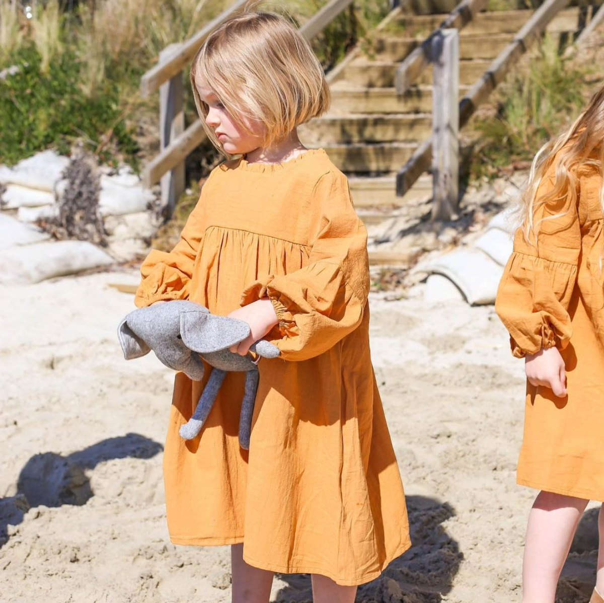 The Poppy dress features a ruffled neck with fluted sleeves. With a hemline that falls well below the knee, the Poppy dress enables your little one to run, jump and play with ease. Made from durable and easy to wash linen viscose blend. Loui the Label
